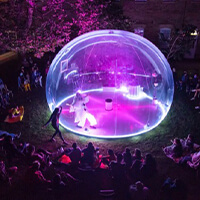 Step into a world of dreams, absurdity, and whimsical charm at the live performance of "La Bulle", set against the picturesque backdrop of MacDonald Park in Kingston, Ontario